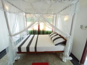 Ένα ή περισσότερα κρεβάτια σε δωμάτιο στο Bluebell Guest House