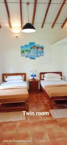 Ένα ή περισσότερα κρεβάτια σε δωμάτιο στο Mango House Japanese Guest House