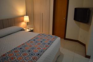 Postel nebo postele na pokoji v ubytování Catussaba Suítes Resort + 37 fotografií