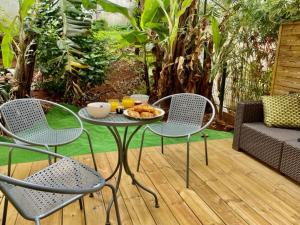 Posezení v ubytování Nouveauté - L'Oasis - T3 - 70 M2 - Jacuzzi
