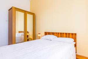 Postel nebo postele na pokoji v ubytování Holiday Home Grande