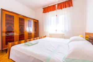 Postel nebo postele na pokoji v ubytování Holiday Home Grande