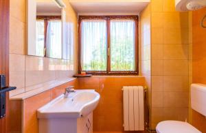 Koupelna v ubytování Holiday Home Grande