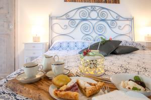Llit o llits en una habitació de Once upon a time in Masseria Sitamara
