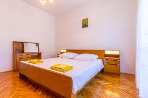 Postel nebo postele na pokoji v ubytování Holiday Home Grande