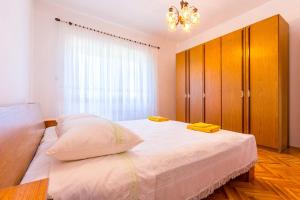 Postel nebo postele na pokoji v ubytování Holiday Home Grande