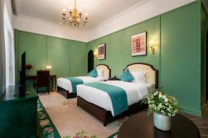 Ένα ή περισσότερα κρεβάτια σε δωμάτιο στο Hotel Indigo Heilong Lake, an IHG Hotel