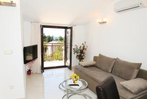 TV a/nebo společenská místnost v ubytování Apartments Jasmina