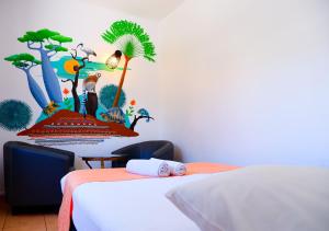 Postel nebo postele na pokoji v ubytování Hôtel Du Cirque + 22 fotografií