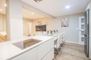 Kuchyň nebo kuchyňský kout v ubytování Hípica Apartment Granada