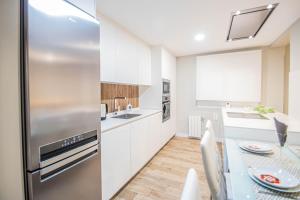 Kuchyň nebo kuchyňský kout v ubytování Hípica Apartment Granada