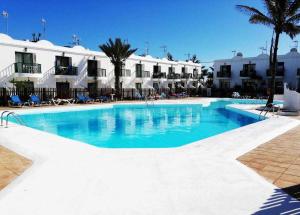 Basen w obiekcie Sinfonia Corralejo iRent Fuerteventura lub w pobliżu