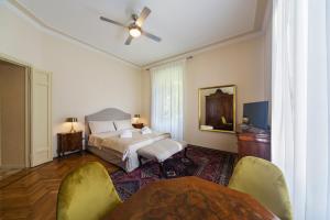 Postel nebo postele na pokoji v ubytování BED and BIKE - BERGAMO Dream House