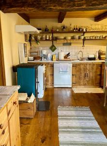 Kuchyň nebo kuchyňský kout v ubytování Country House Novosel