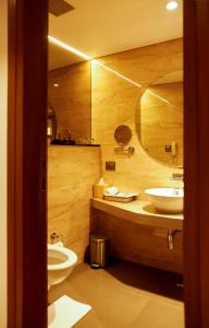 Koupelna v ubytování Nemesia City Center - Gurugram, Sector 29