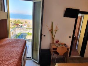 Postel nebo postele na pokoji v ubytování Hotel Tilmar