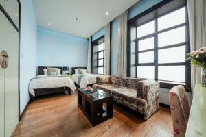Postel nebo postele na pokoji v ubytování Gracie Art Hotel + 37 fotografií