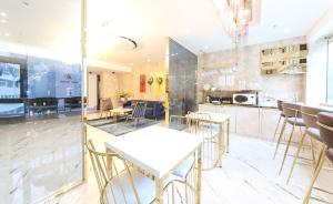 Kuchyň nebo kuchyňský kout v ubytování Brown-Dot Hotel Songdo