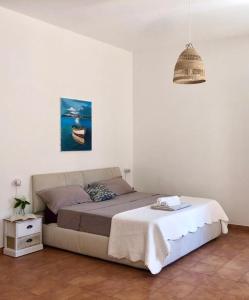 Postel nebo postele na pokoji v ubytování Piazza Marina Open Space