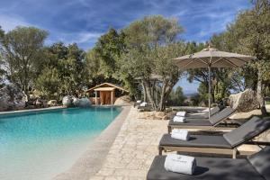 The swimming pool at or close to Gallicantu Stazzo Retreat