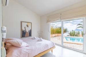 Posteľ alebo postele v izbe v ubytovaní Altea Hills Villa Noruega