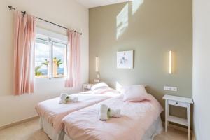 Posteľ alebo postele v izbe v ubytovaní Altea Hills Villa Noruega