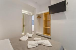 TV a/nebo společenská místnost v ubytování Barbarigos luxury spa apartments