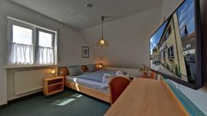 Postel nebo postele na pokoji v ubytování Hotel Gasthof Lachner