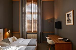 Llit o llits en una habitació de YoHo - The Young Hotel
