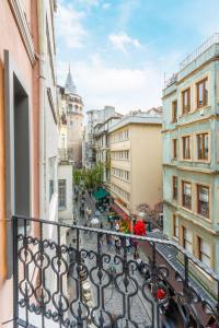a view of a city from a balcony at Hotel Des Arts Galata in Istanbul +102 photos