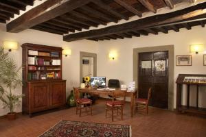 Телевизор и/или развлекательный центр в Agriturismo Colognole