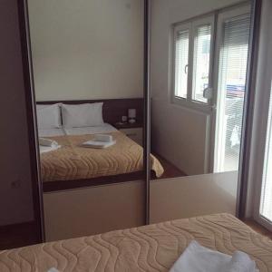 Postelja oz. postelje v sobi nastanitve New apartment located in the heart of Niksic.