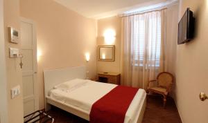 TV a/nebo společenská místnost v ubytování Hotel Rita Major