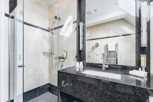Koupelna v ubytování Hotel Moosburger Hof