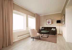 TV a/nebo společenská místnost v ubytování Røros Hotell - Bad & Velvære