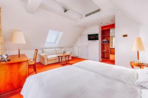 Postel nebo postele na pokoji v ubytování Hotel Moosburger Hof
