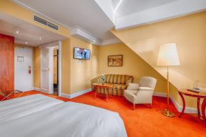 Postel nebo postele na pokoji v ubytování Hotel Moosburger Hof