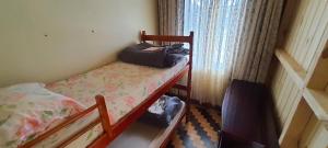 Krevet ili kreveti u jedinici u objektu Hostel Caxias do Sul