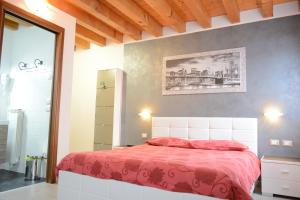 Postel nebo postele na pokoji v ubytování B&B Casa Taty
