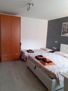 Postel nebo postele na pokoji v ubytování B&B Casa Taty