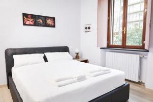 Posteľ alebo postele v izbe v ubytovaní Prestige Boutique Homes - Navigli