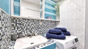 Koupelna v ubytování O'Cœur Cozy + 18 fotografií