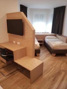 Posteľ alebo postele v izbe v ubytovaní Hotel Cantaleone