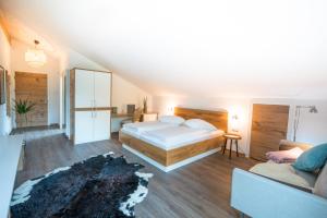 Postel nebo postele na pokoji v ubytování Stefanies-Café-Pension-Kultur + 21 fotografií