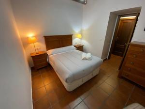 Katil atau katil-katil dalam bilik di Apartamento San Fernando