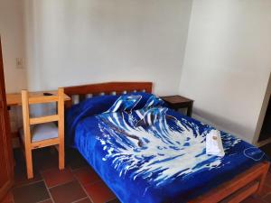 En eller flere senger på et rom på Hotel El santuario