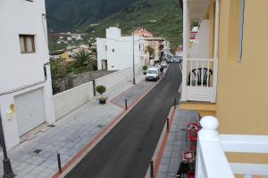 a view of a street from a balcony of a building at Pension El Guanche in Frontera