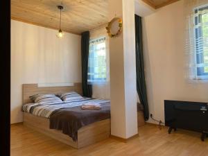 Postel nebo postele na pokoji v ubytování Stoykite Escape House