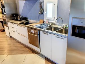 Kuchyň nebo kuchyňský kout v ubytování Résidence Verdi - Appartements meublés en centre ville