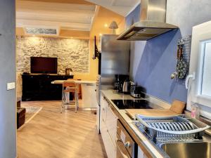 Kuchyň nebo kuchyňský kout v ubytování Résidence Verdi - Appartements meublés en centre ville